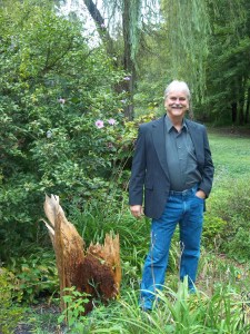 Don Williams with garden sculpture